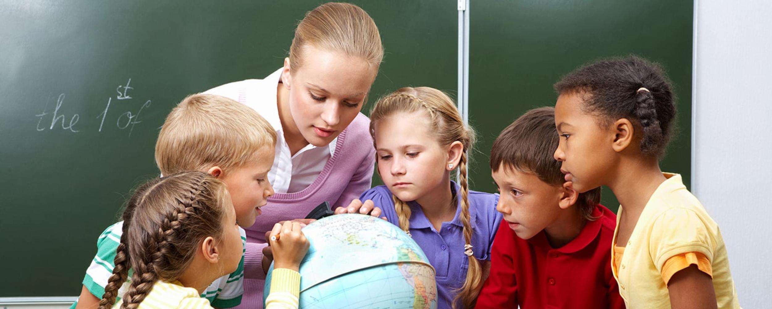 Geography students with Globe